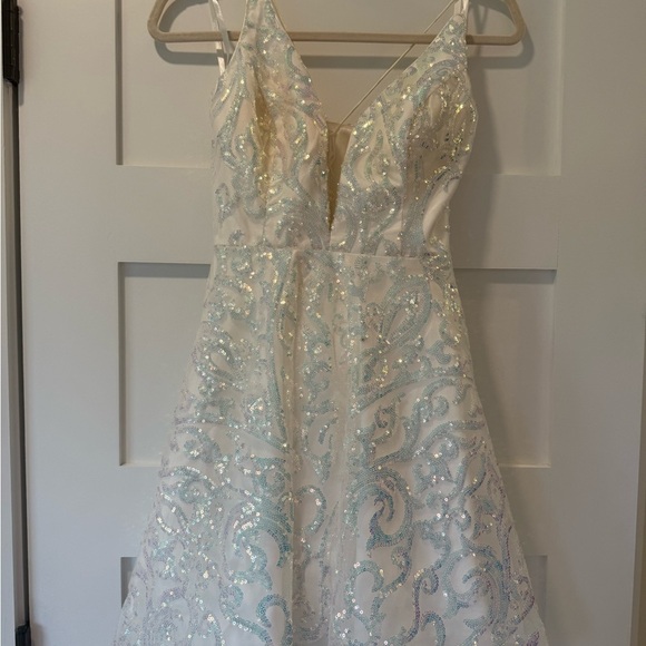 White Fit and Flare Mini Dress with Plunge Neckline. - Picture 3 of 6